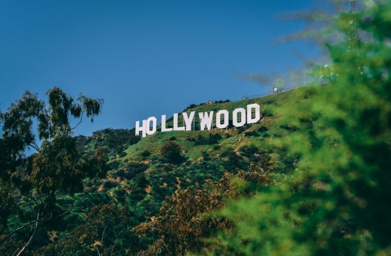 A scenic view of the famous Hollywood sign on a sunny day in Los Angeles.